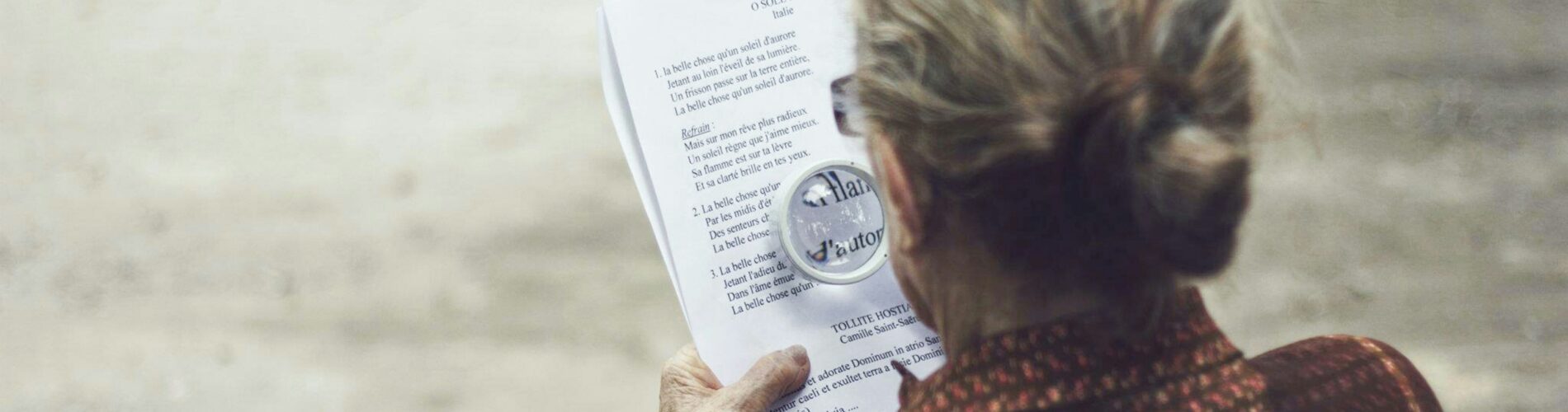 a person reading a paper