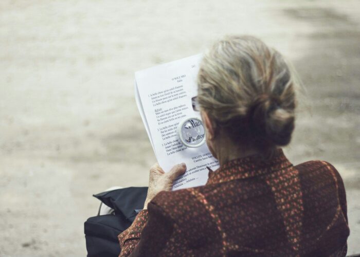 a person reading a paper